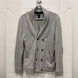 H&M cardigan sweater. Gray in color with navy elbow pads. Large